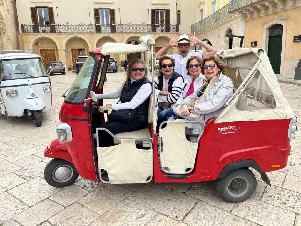 Ana, her 3 friends and our expert tour guide in an Ape Calessino